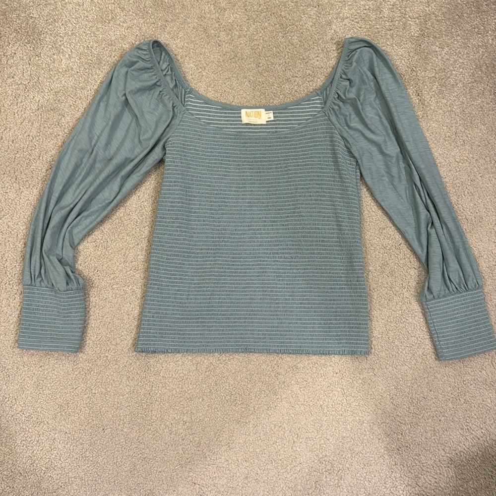 Nations smocked Renaissance long sleeve tee shirt